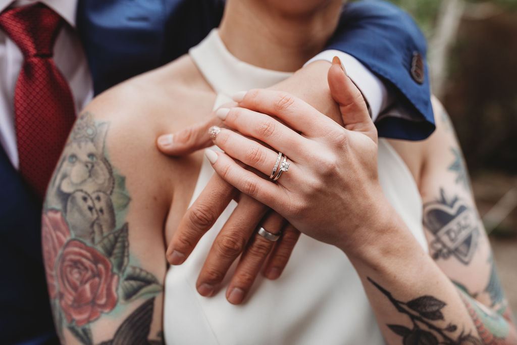 wedding ring photos with tattoo bride and groom