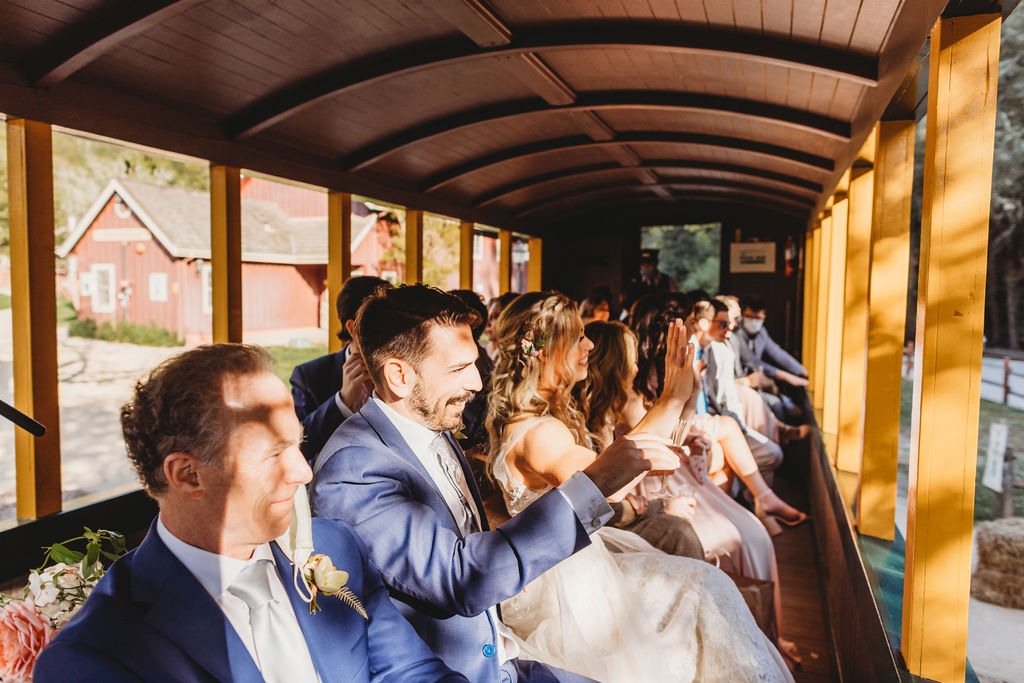 bridal party on wedding train after wedding ceremony