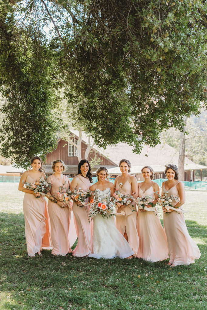 bridesmaids photos of all hugging each other