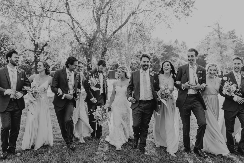 bridal party with bride and groom photos