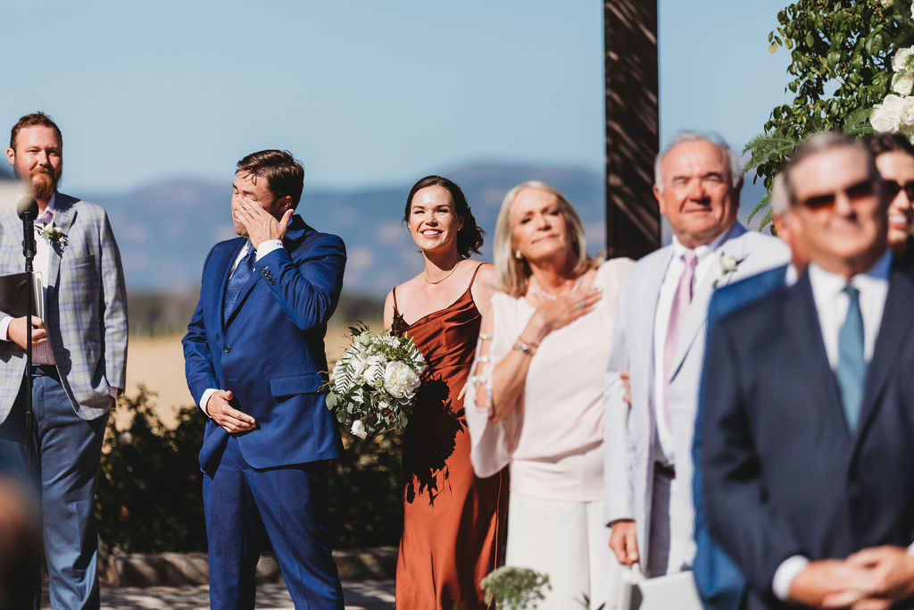 groom reaction to bride walking down aisle