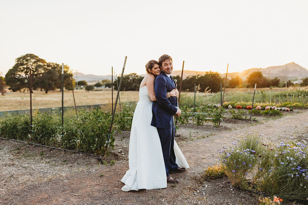 sunset winery wedding photos with bride and groom