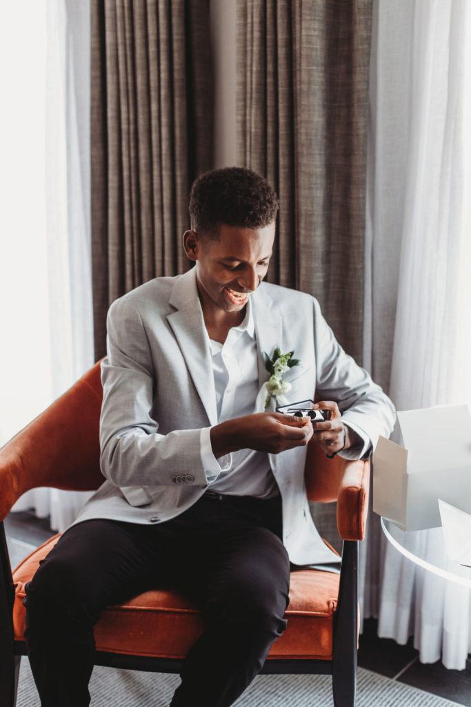 groom getting ready at elopement