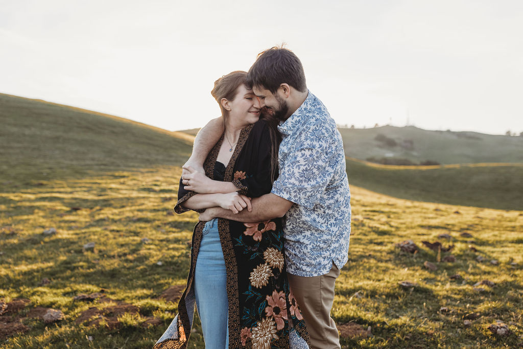 couple hugging during engagement photos at preserve