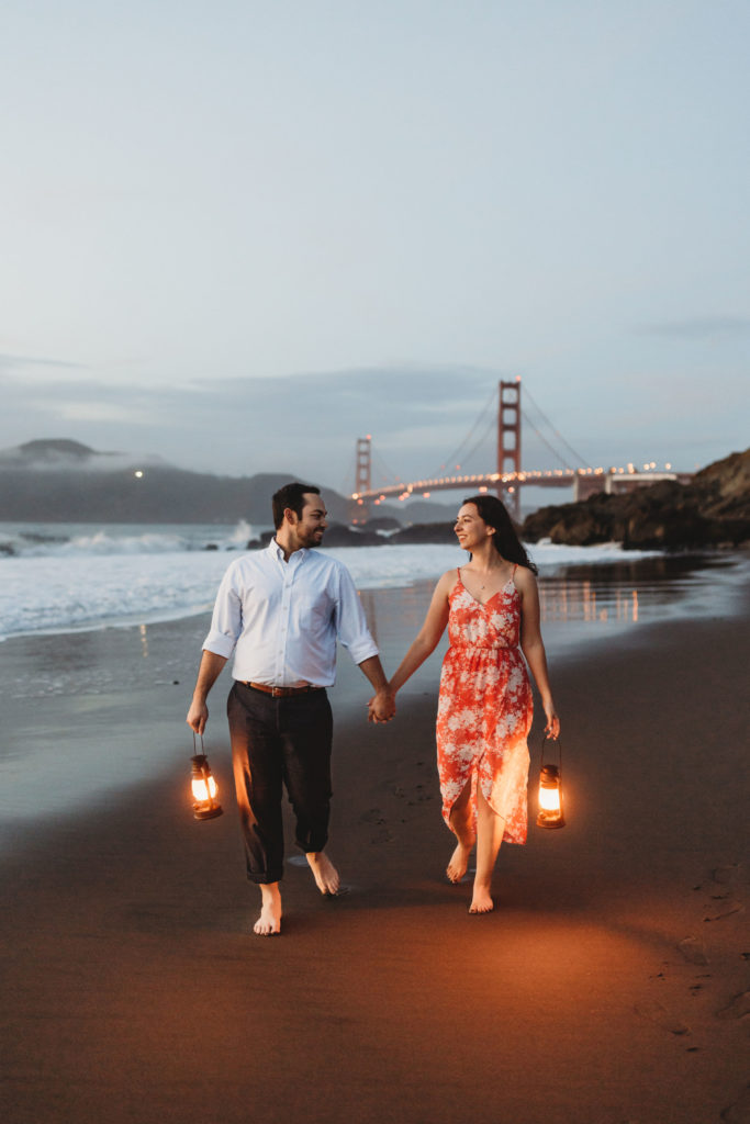 couple walking bakers beach furing engagement photos 