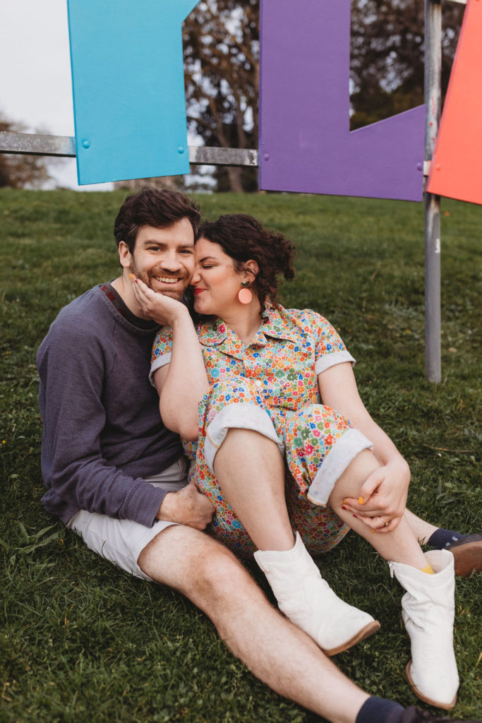 couple posing for engagement photos