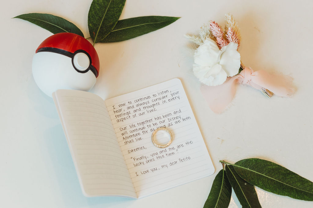 Grooms wedding vows with ring and pokemon ball