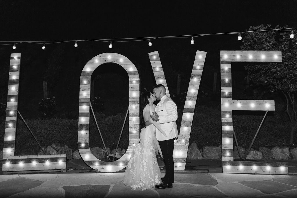 Big sign that says love at wedding