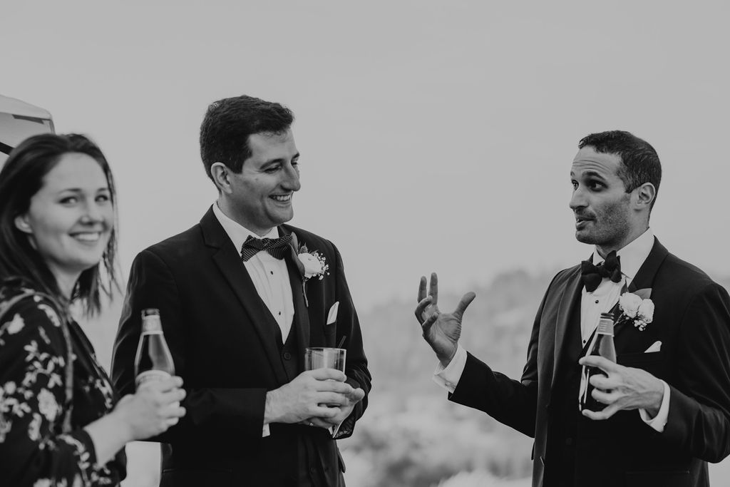groom mingling during wedding reception