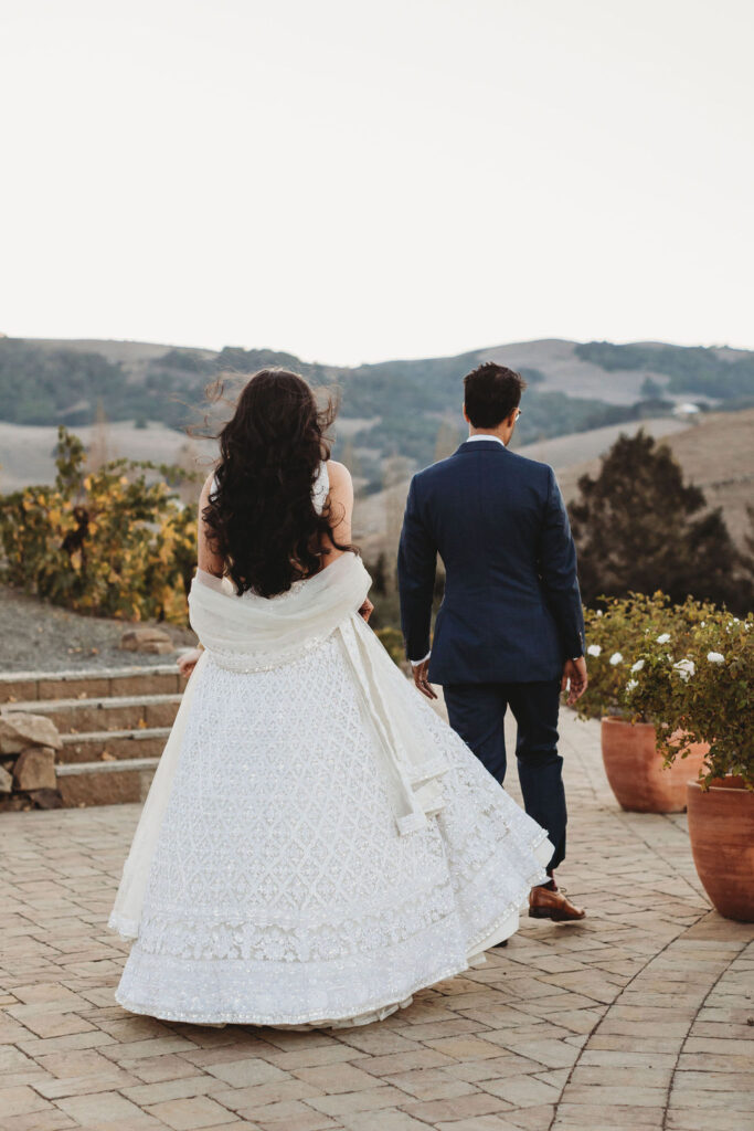 Newlyweds walking around a Sonoma wedding venue